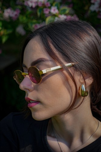 MIU MIU MU B51S - 7OE30Y - 47 Sunglasses Bronze Oval